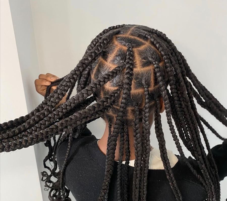 Large knotless braids with triangle parting